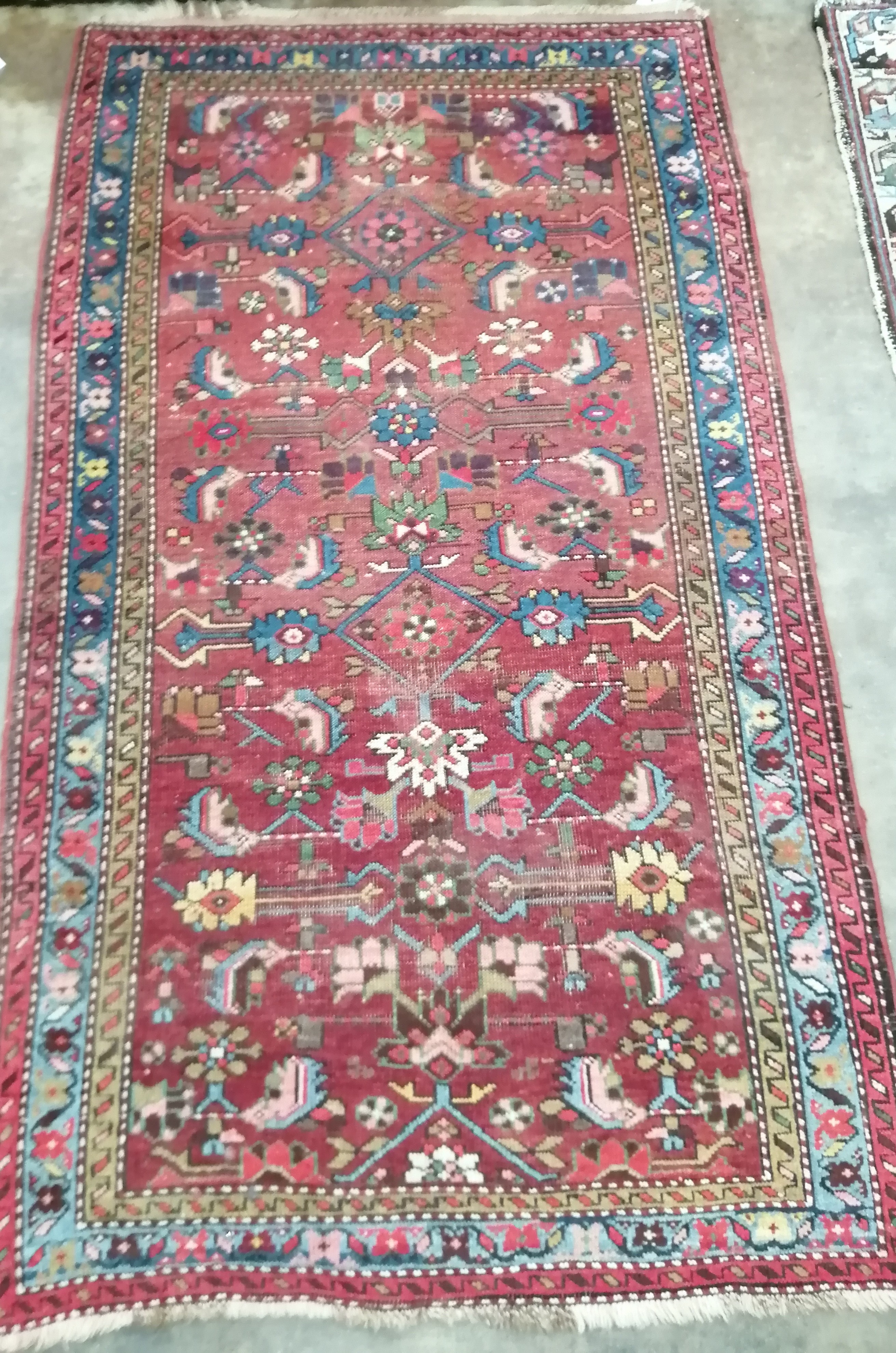 A West Persian red ground rug, 160 x 90cm